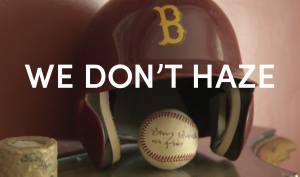 "We Don't Haze" text with a background of a baseball glove and ball.